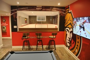 A Ottawa Senators themed "Man Cave" with a synthetic ice rink and TV