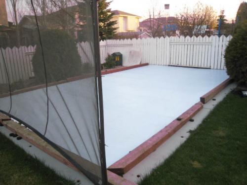 synthetic ice rink in backyard in winnipeg